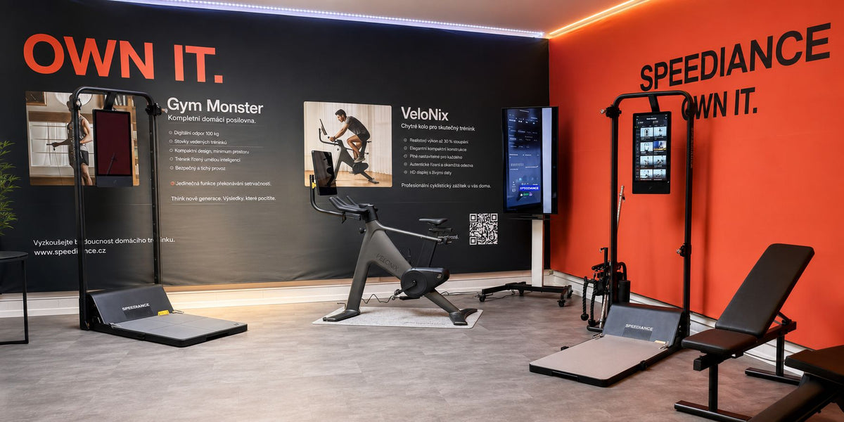 Showroom Speediance Ivančice s Gym Monster a VeloNix u oranžové a černé stěny